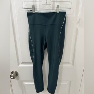 Athleta Interval Stash Tipped 7/8 TighDark Teal Leggings with Light Blue Accents